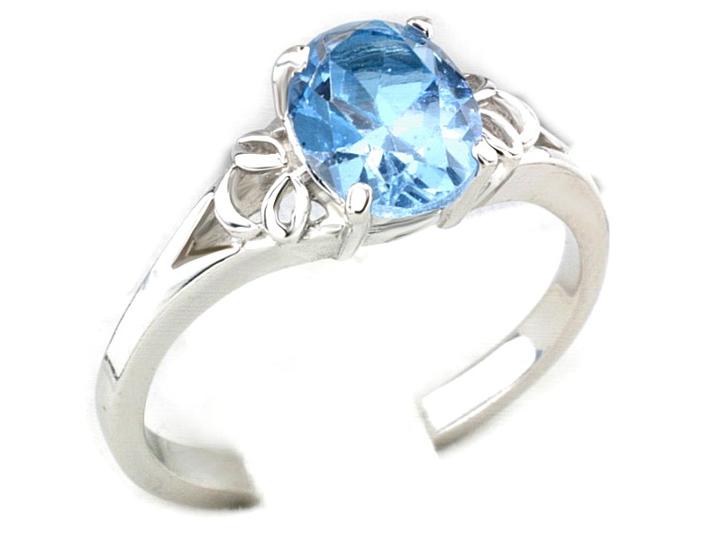 Złoty pierścionek z topazem białe złoto - bjg348