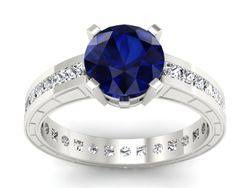 Złoty pierścionek z szafirem i diamentami - p15095bsz