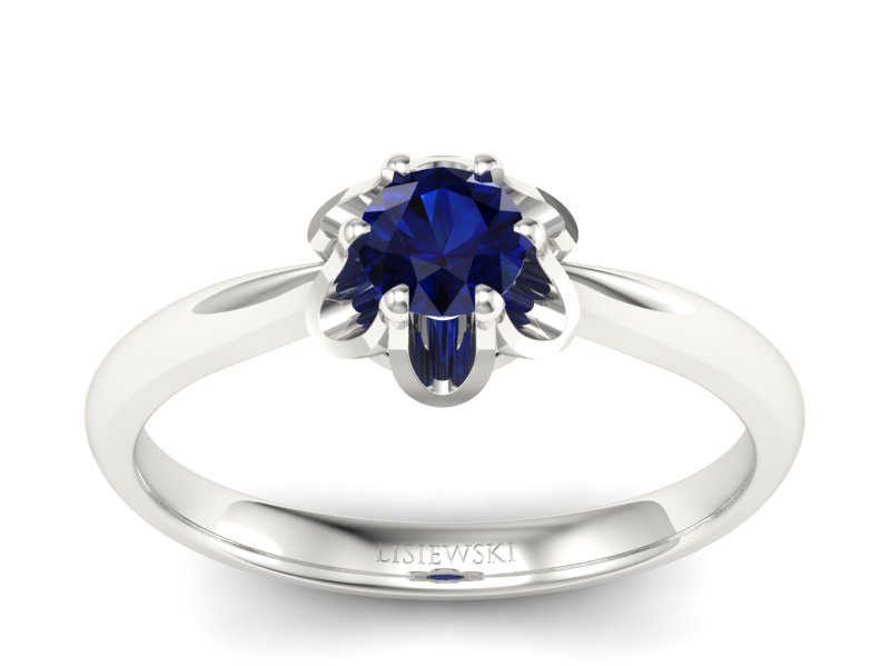 Złoty pierścionek z szafirem białe złoto - P15115bsz