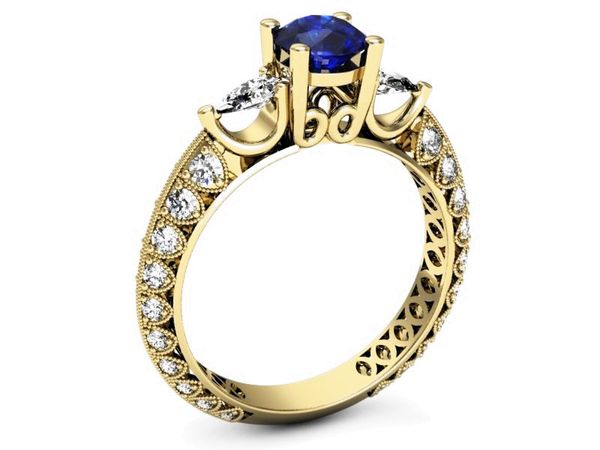 Złoty pierścionek z szafirem i diamentami złoto - P15279zszc