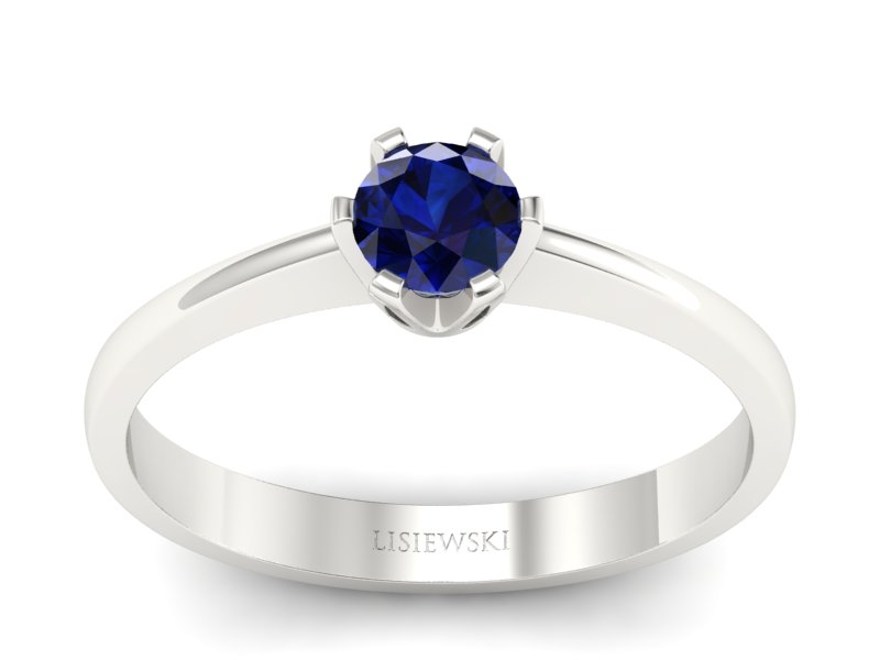 Złoty pierścionek z szafirem białe złoto - P15290bsz