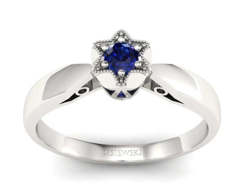 Złoty pierścionek z szafirem białe złoto - p16003bsz