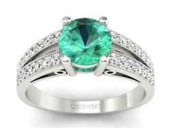 Złoty pierścionek ze szmaragdem z brylantami - p16027bsm