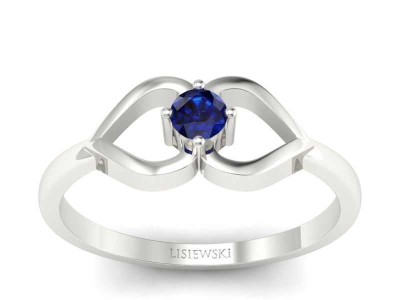 Złoty pierścionek z szafirem białe złoto - p16142bsz