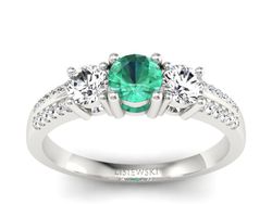 Złoty Pierścionek ze szmaragdem i brylantami - p16160bsm