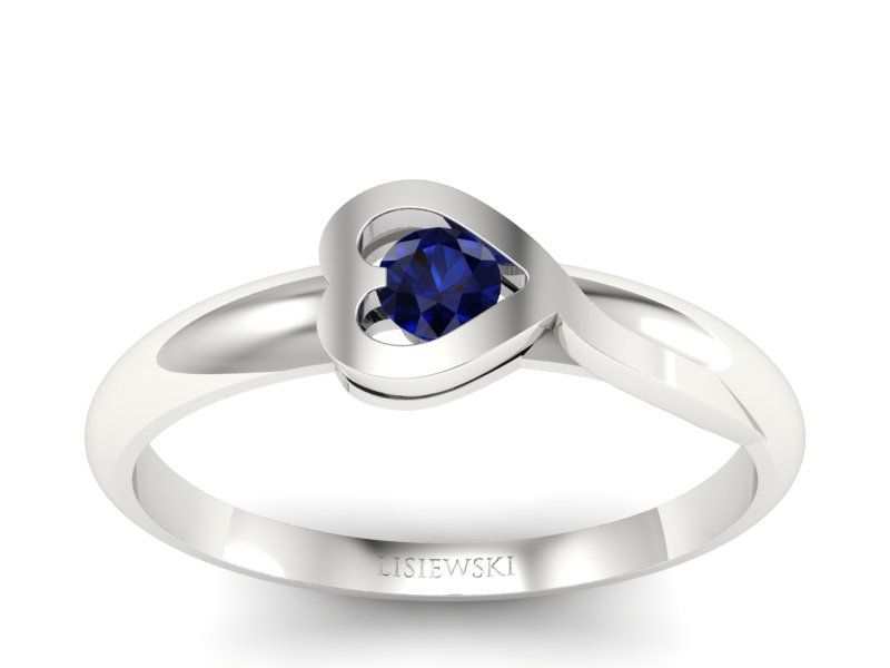 Złoty pierścionek z szafirem w białym złocie - p16179bsz