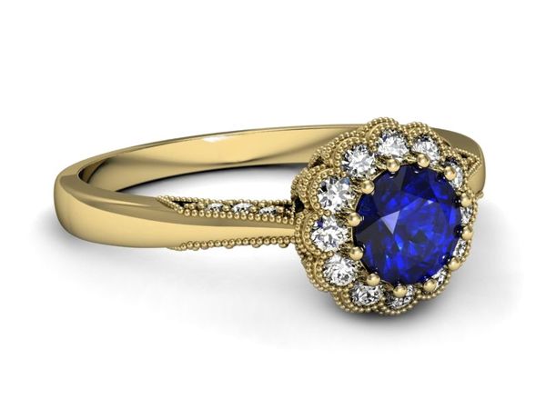 Złoty pierścionek z szafirem i diamentami - p16204zszc