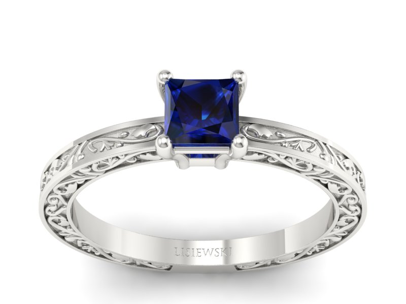 Złoty pierścionek z szafirem białe złoto - p16275bsz