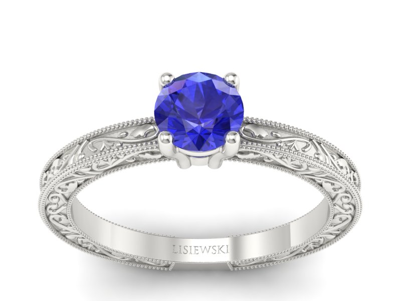 Złoty pierścionek z szafirem białe złoto - p16277bszc