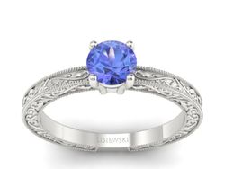Pierścionek z tanzanitem w białym złocie barwny akcent - p16277bt