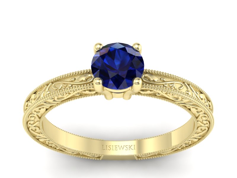 Złoty pierścionek z szafirem żółte złoto - p16277zsz