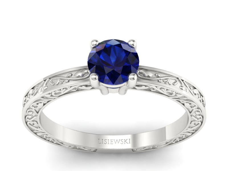 Złoty pierścionek z szafirem białe złoto - p16278bsz