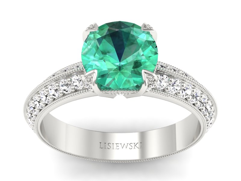 Złoty pierścionek ze szmaragdem i brylantami - p16288bsm