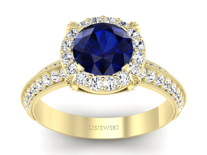 Złoty pierścionek z szafirem i diamentami - p16290zsz