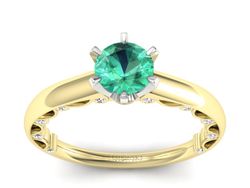 Złoty pierścionek ze szmaragdem i brylantami - p16400zbsm