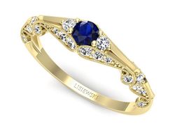 Złoty pierścionek z szafirem i diamentami - p16589zsz