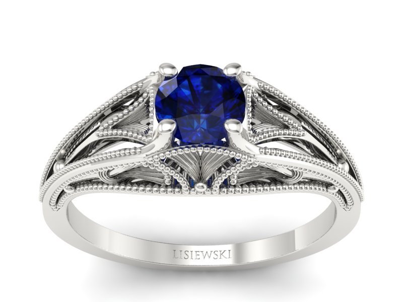 Złoty pierścionek z szafirem białe złoto - p16667bsz