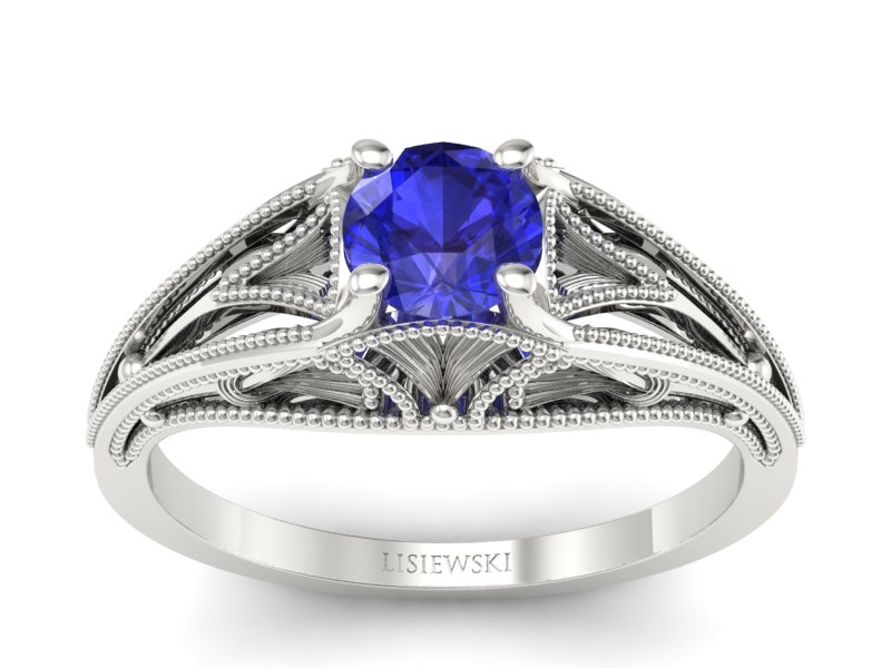 Złoty pierścionek z szafirem białe złoto - p16667bszc