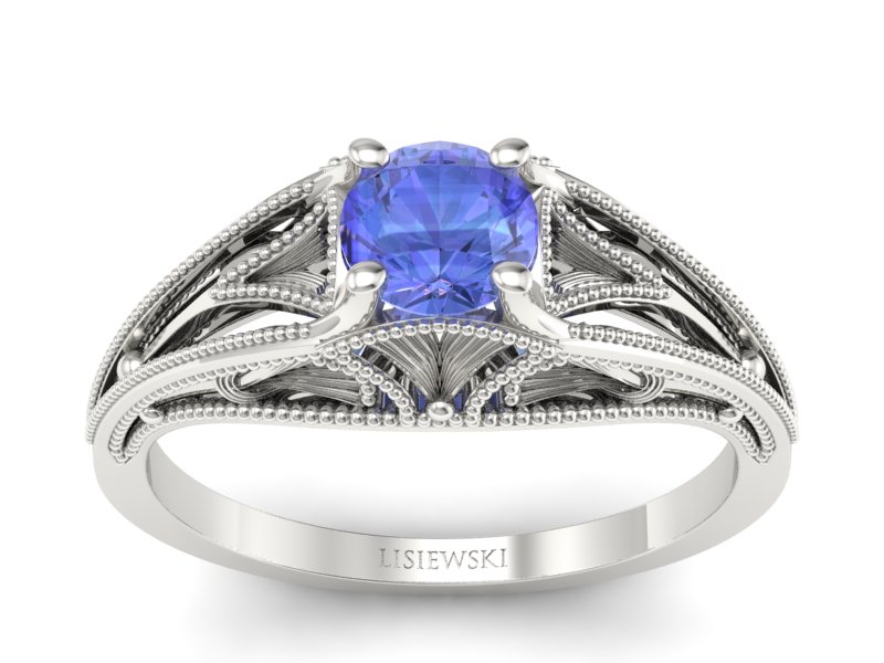 Złoty pierścionek z białego złota z tanzanitem - p16667bt