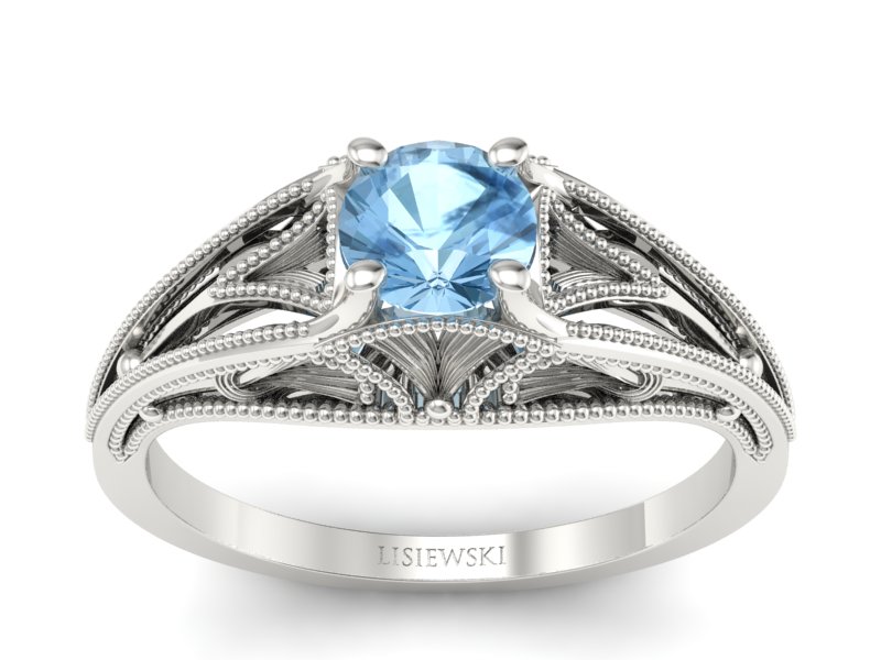 Złoty pierścionek z topazem białe złoto - p16667btp