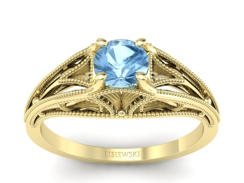 Złoty pierścionek z topazem żółte złoto - p16667ztp