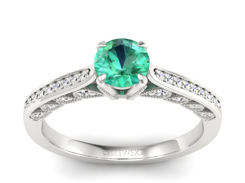 Złoty pierścionek ze szmaragdem i brylantami - p16812bsm